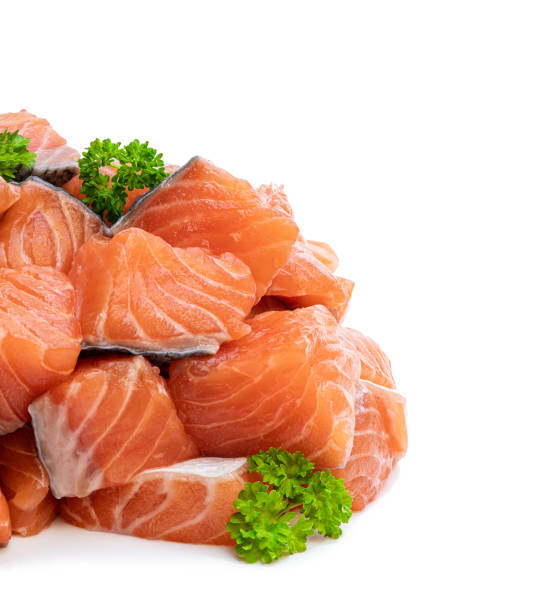istock Fresh salmon fillet cubes isolated on white 1224366038