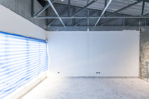 istock Construction site of empty Interior space, unfinished building after demolition process. Home improvement and renovation business. 1224367452