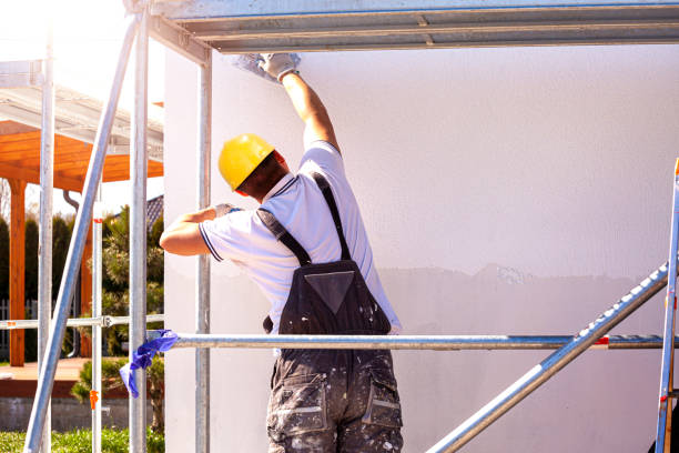 construction worker plasters the building facade. - plasterer plaster wall dirty imagens e fotografias de stock