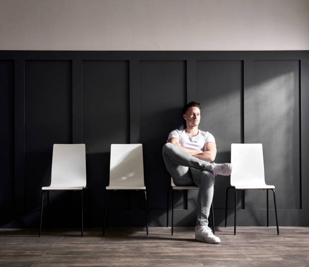 istock Young male waiting in waiting room 1224369617