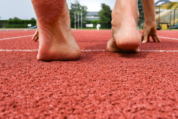istock Barefoot athlete closeup ready for initial shot 1224370899