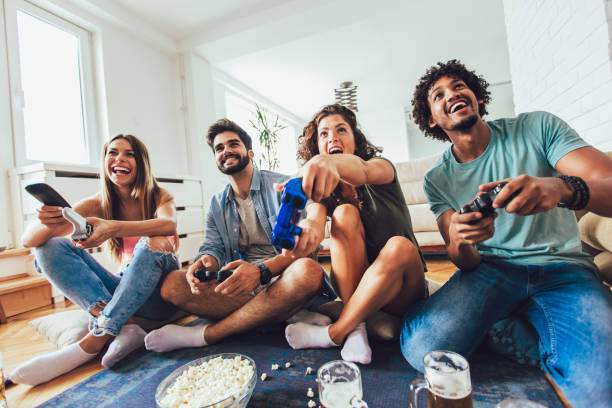Multiethnic group of people playing online video games on tv