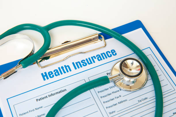 istock Health insurance with insurance claim form and stethoscope. 1224376201