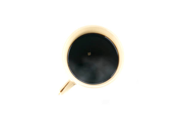 istock Top view black coffee cup isolated on white background. Close up top view coffee in handle cup with copy space. Hot black coffee with smoke. 1224381152