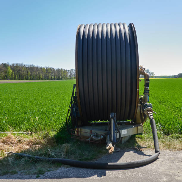 Long hose on a huge hose drum which is used to irrigate the farmer's fields