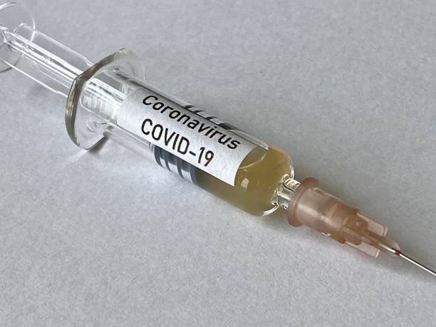 istock Single dose vaccination syringe with Coronavirus Covid-19 label 1224385375