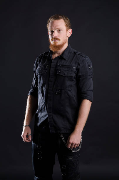 istock Redhead metalhead in black 1224387095
