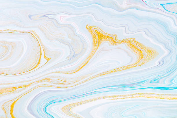istock Fluid art texture. Backdrop with abstract mixing paint effect. Liquid acrylic picture with flows and splashes. Mixed paints for baner or wallpaper. White, blue and golden overflowing colors. 1224387555
