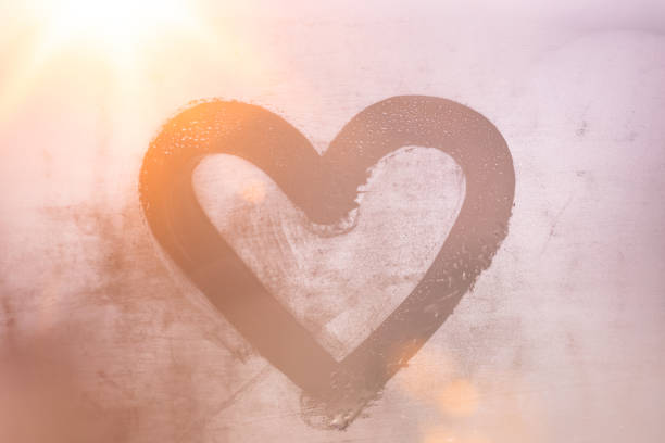 Heart on fogged glass. This file is cleaned and retouched.