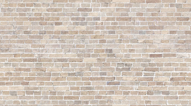 Brick wall seamless texture. Beige stone pattern background Beige Brick wall seamless pattern background. Whitewashed stone texture background wall building feature stock pictures, royalty-free photos & images