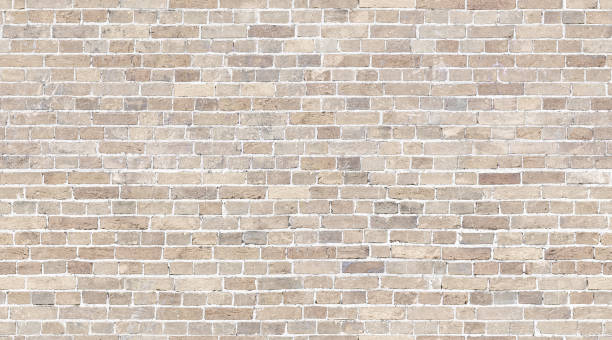 brick wall seamless texture. beige stone pattern background - activity block design colors imagens e fotografias de stock