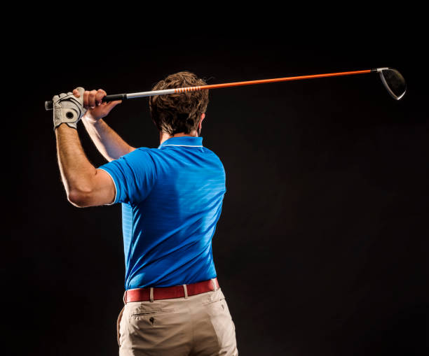 istock Close up Golfer is driving golf ball to green course 1224390510