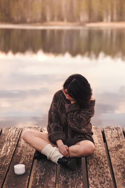 istock young girl drinks coffee outdoors emotions 1224390993