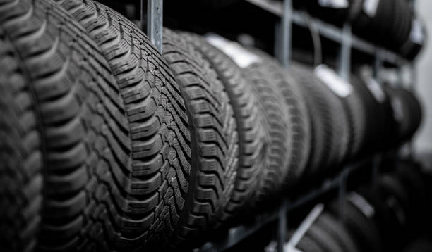 istock changing tires - summer or winter season - tread 1224392659