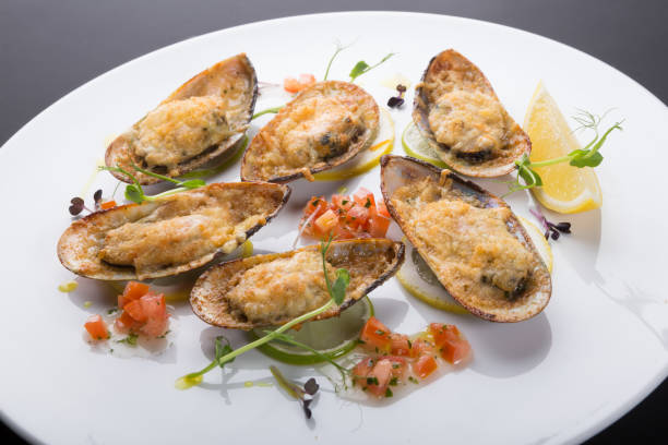 istock Baked mussels with cheese 1224394117