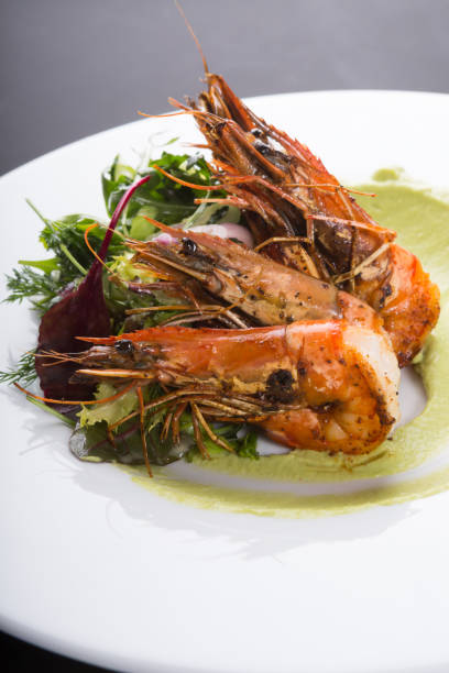 istock Fried king shrimps with guacomole 1224394627