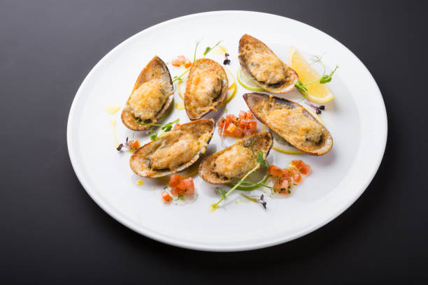 istock Baked mussels with cheese 1224395027