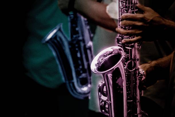 istock two musicians playing the sax 1224395153
