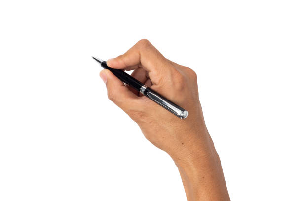 istock man hand holding pen isolated on white background 1224395392