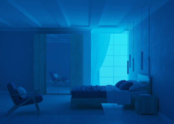istock Modern bedroom interior with blue walls. Night. Evening lighting. 3D rendering. 1224397354