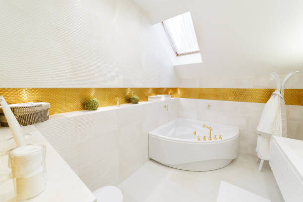 istock White bathroom with gold trim. Corner bathroom, chic mirror with washbasin. 1224398511