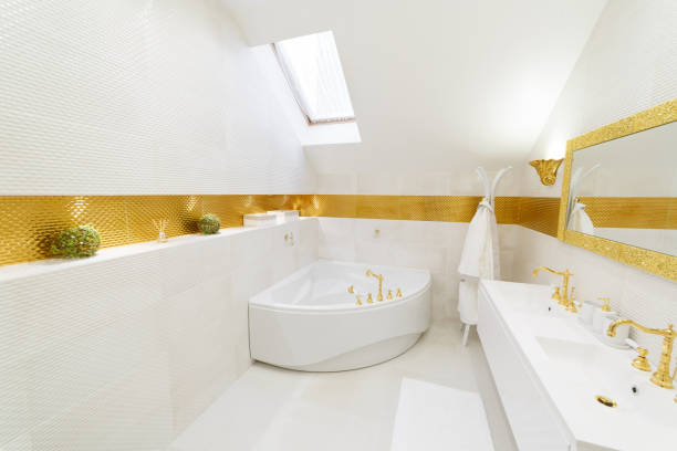 istock White bathroom with gold trim. Corner bathroom, chic mirror with washbasin. 1224398612