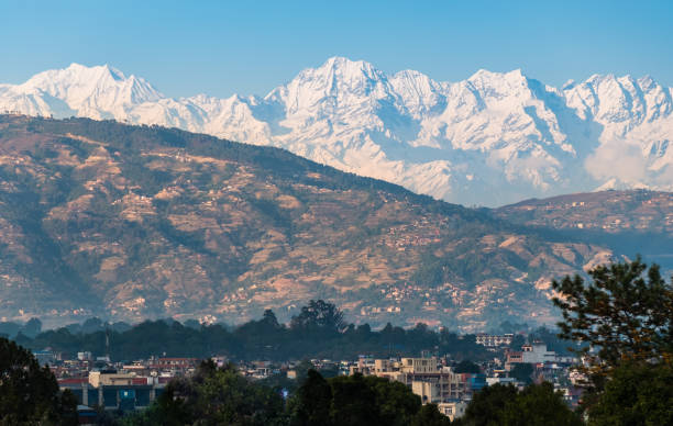 istock High mountain landscape behind a city 1224399000