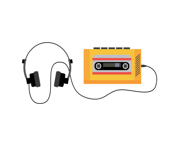 istock Yellow portable retro cassette tape player with headphones, 1224400340