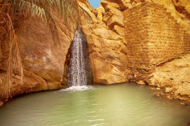 View of waterfall in mountain oasis Chebika, Sahara desert, Tunisia stock photo