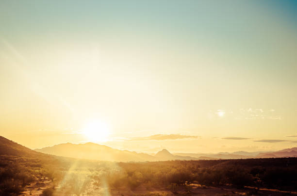 istock The sun setting behind mountains in the Sonoran Desert 1224410912