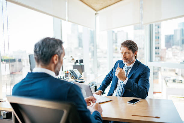 istock Portrait of two managers in modern office 1224411799