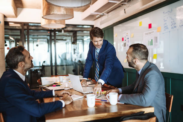 istock mature latino businessman in office 1224411959