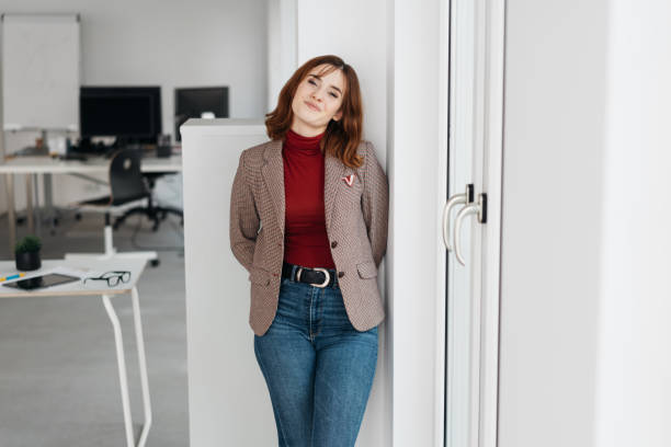 istock Cute young businesswoman with friendly smile 1224413031