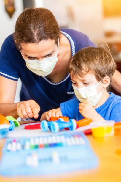 istock Child boy learning with colorful clays while locked down because pandemic 1224414017