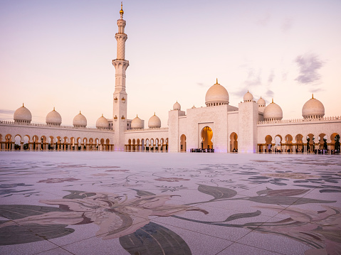 ABU DHABI, UAE - OCTOBER 10, 2019: view of the bold architecture of the Sheikh Zayed Grand Mosque in Abu Dhabi, United Arab Emirates.