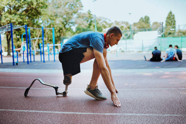 istock Man with prosthetic leg on running outdoors 1224415314