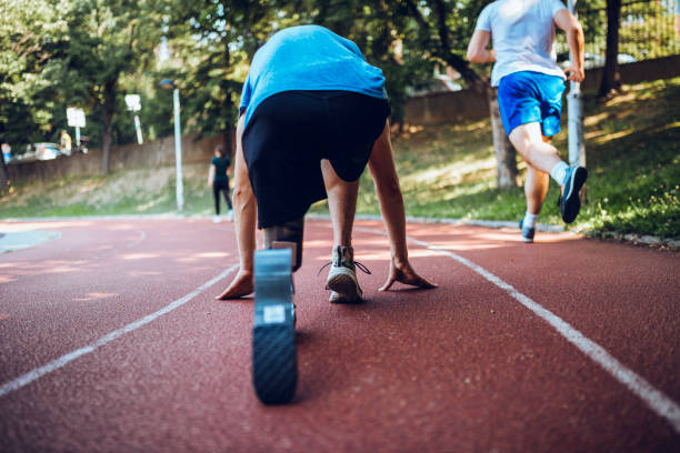 istock Man with prosthetic leg on running outdoors 1224415382
