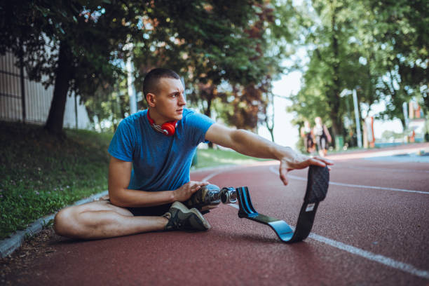 istock Man with prosthetic leg on running outdoors 1224415393