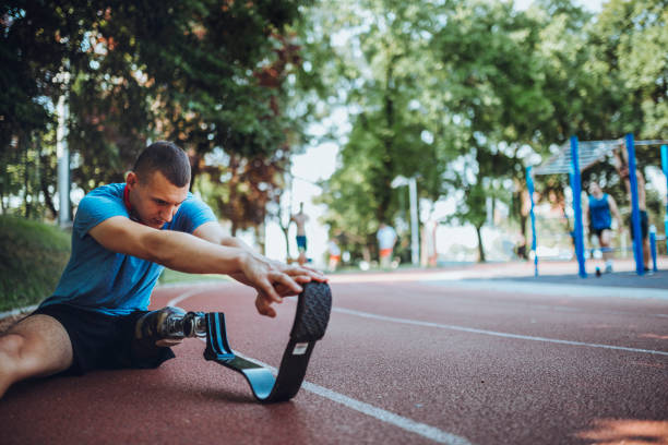 istock Man with prosthetic leg on running outdoors 1224415397