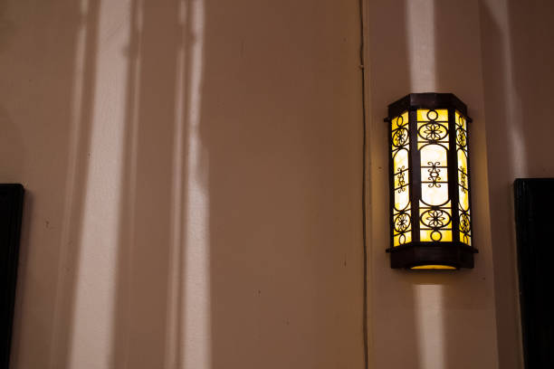 istock old lamp in the wall with night light 1224418501