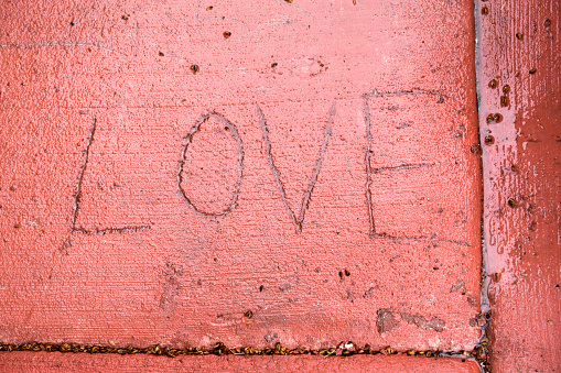 Love written on the sidewalk