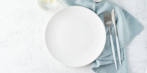 clean empty white plate white stone table, copy space, mock up, top view, long banner - pano de prato imagens e fotografias de stock