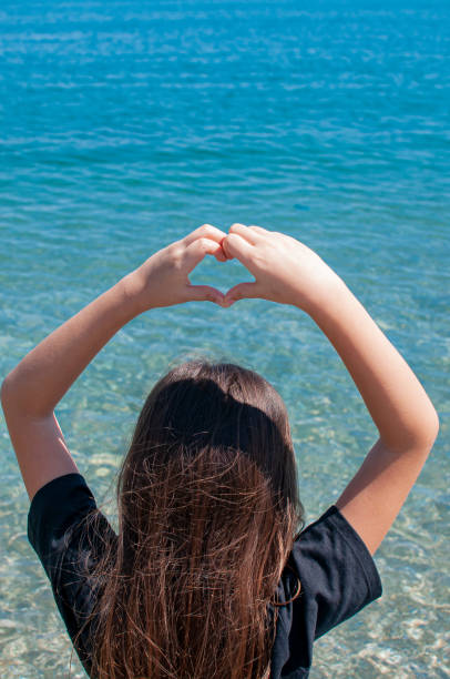 istock Cute little girl on the beach 1224421802
