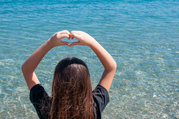 istock Cute little girl on the beach 1224421861