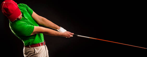 istock Close up Golfer is driving golf ball to green course 1224422505