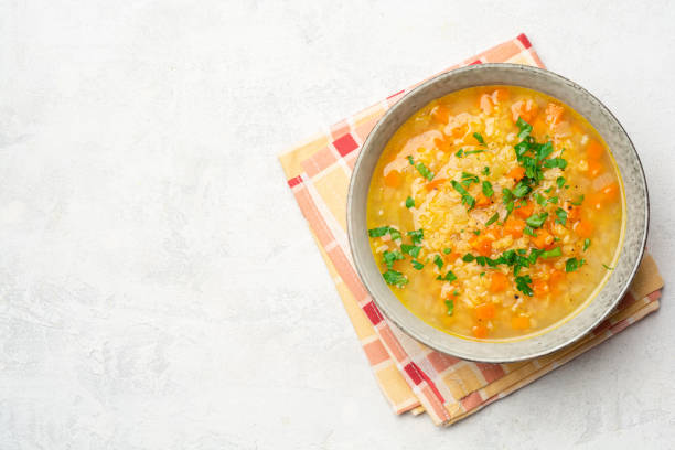 istock Lentil soup with vegetables in bowl on concrete background 1224423125