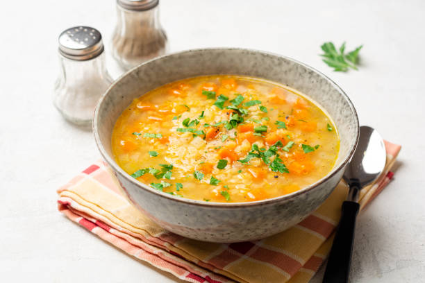 istock Lentil soup with vegetables in bowl on concrete background 1224423130