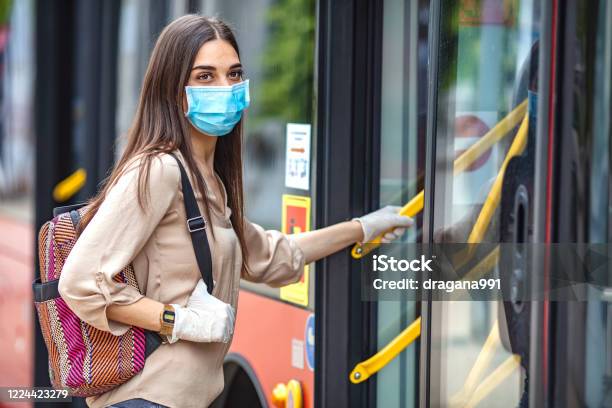 Virus Protection In Public Transportation Stock Photo - Download Image Now - Bus, Public Transportation, Protective Face Mask