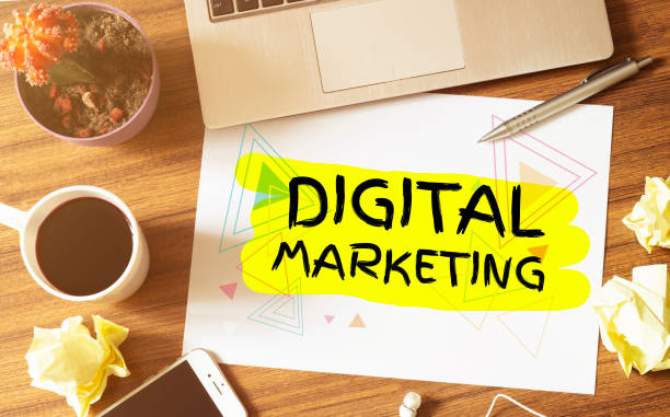 istock Office Desk with Tools and Notes About DIGITAL MARKETING 1224427299