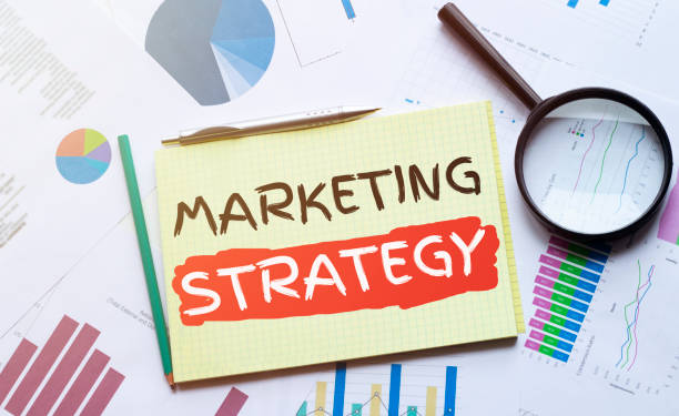 istock Notebook with Toolls and Notes about Marketing. MARKETING STRATEGY text 1224427363